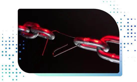 Broken metal chain connected temporarily by a paperclip under red illumination on a dark background.