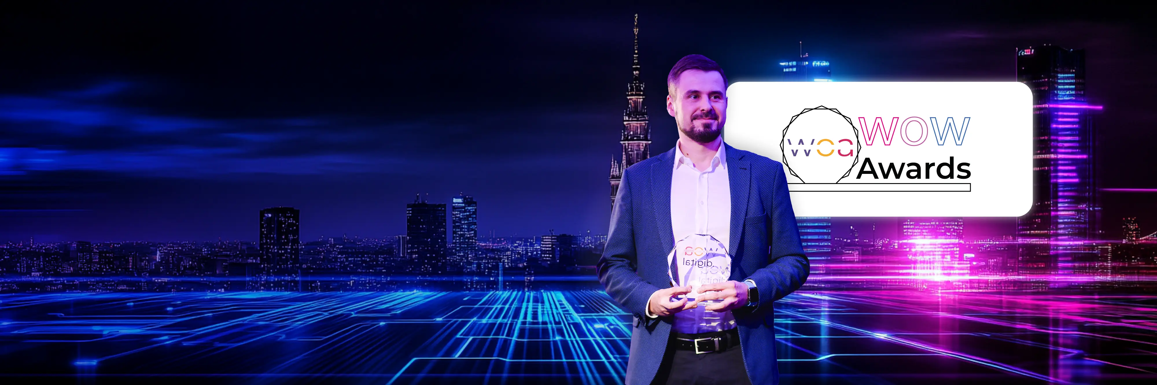 Man holding WOA WOW Award statuette