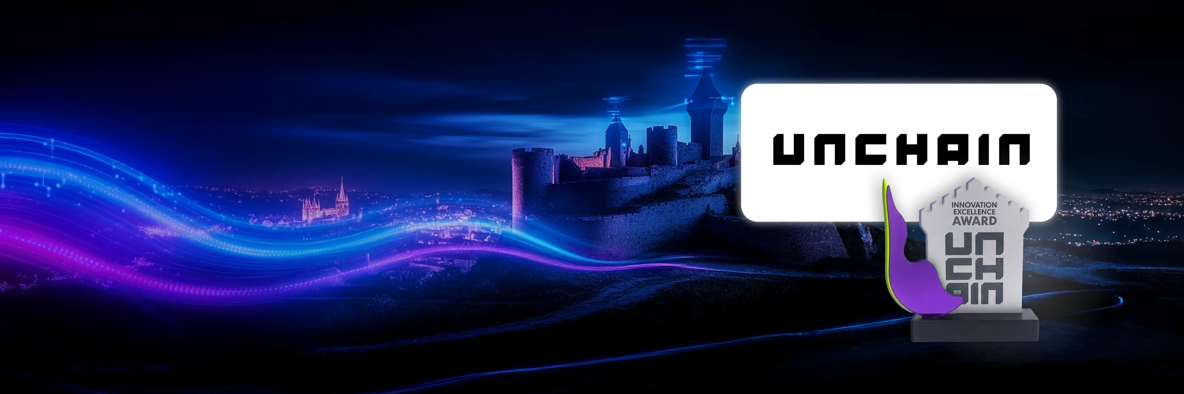 Unchain Innovation Excellence Award trophy displayed against a night landscape with an illuminated c