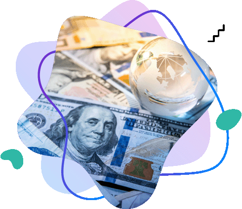 Glass globe resting on&nbsp;US&nbsp;dollar banknotes, representing international trade and global finance.