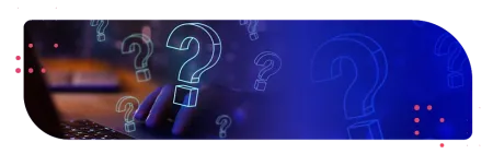 Person typing on&nbsp;laptop keyboard behind glowing question mark icons on&nbsp;a&nbsp;blue digital background.